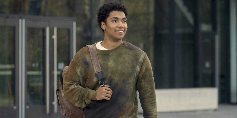 Chance Pedermo in Gen V walking and smiling while wearing a backpack