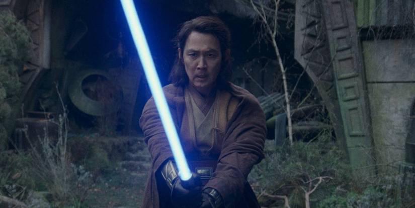 Lee Jung-jae in The Acolyte using a blue lightsaber