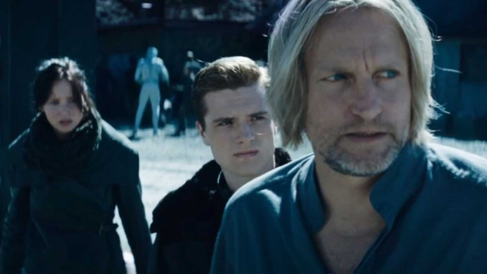 Woody Harrelson as Haymitch with Katniss and Peeta in the Hunger Games sequel Catching Fire