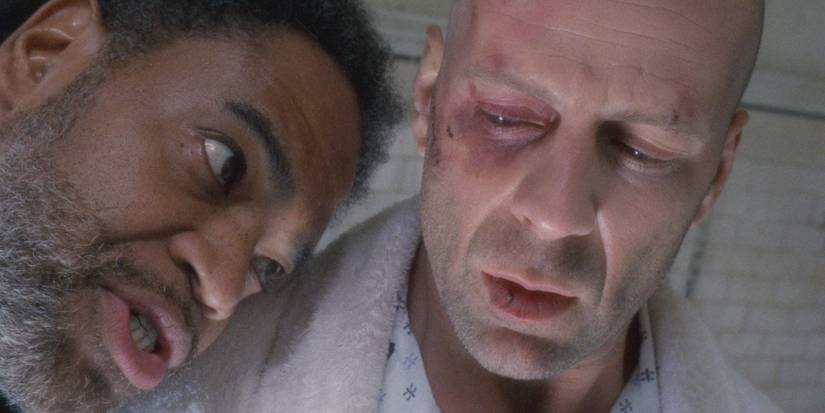 Bruce Willis as James Cole and Vernon Campbell as Tiny in 12 Monkeys (1995)