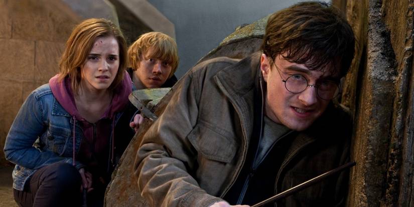 Daniel Radcliffe as Harry Potter, Rupert Grint as Ron Weasley, and Emma Watson as Hermione Granger in Deathly Hallows