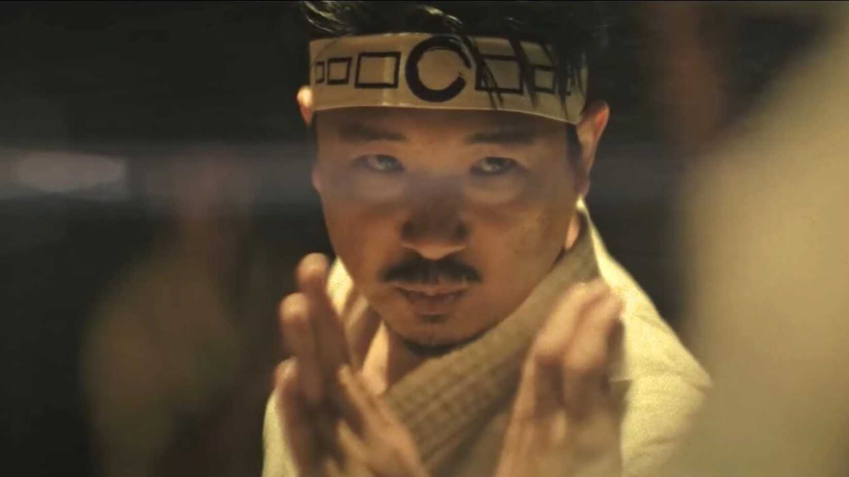 A flashback dream sequence of a younger Mr. Miyagi ready to fight at a tournament in Cobra Kai