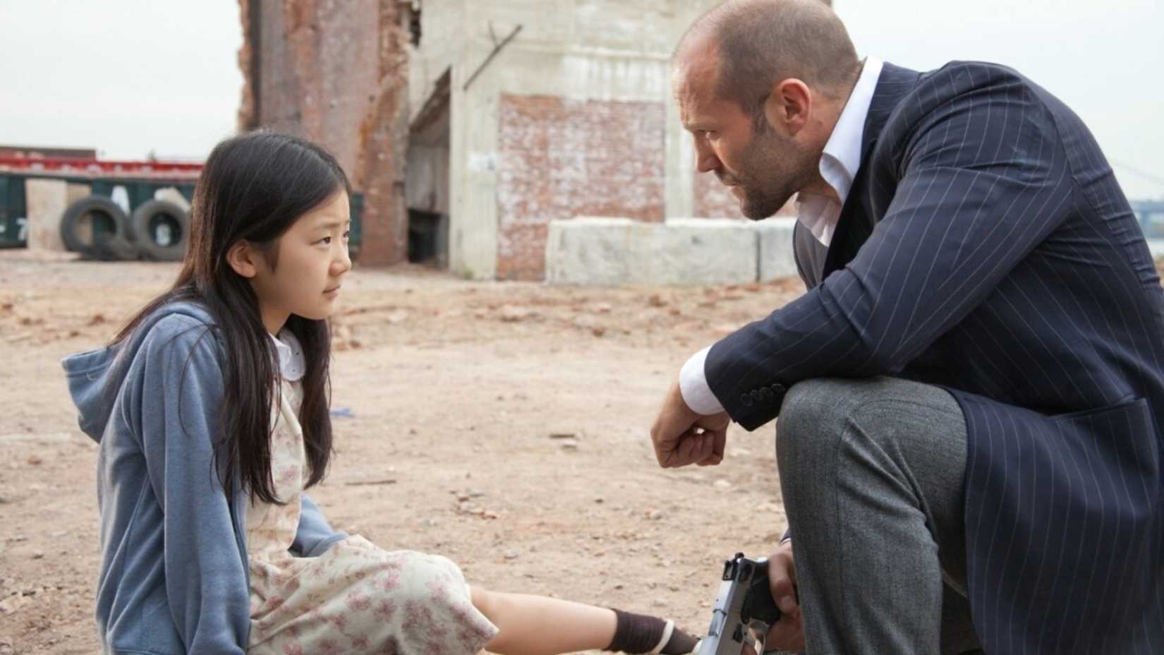 Jason Statham protects a girl in Safe