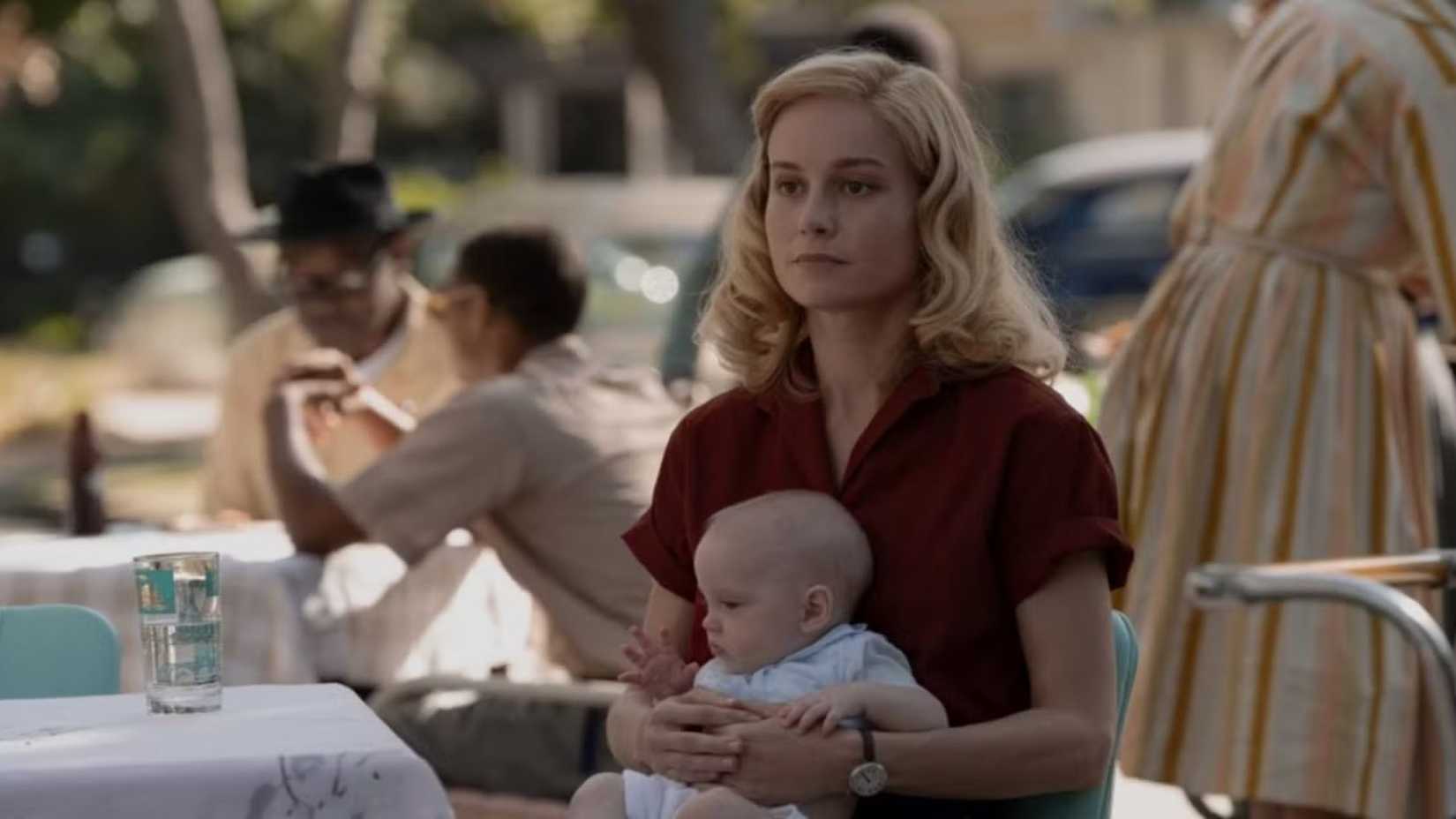 Brie Larson in Lessons in Chemistry  holding a baby