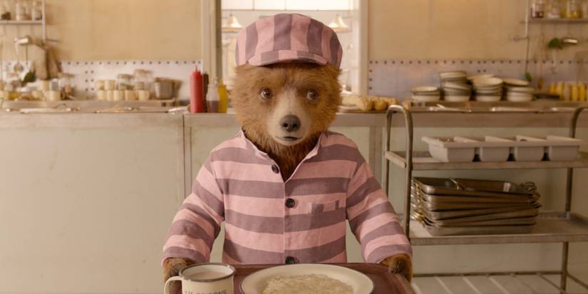 Paddington wearing striped clothes in Paddington 2