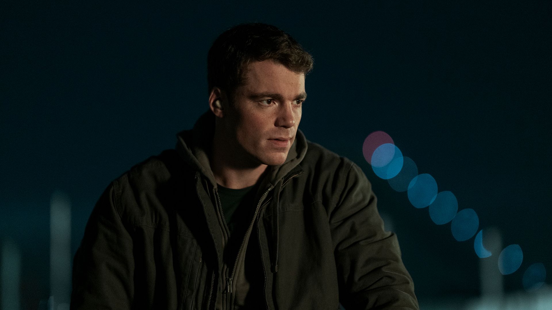 Peter standing outside in The Night Agent