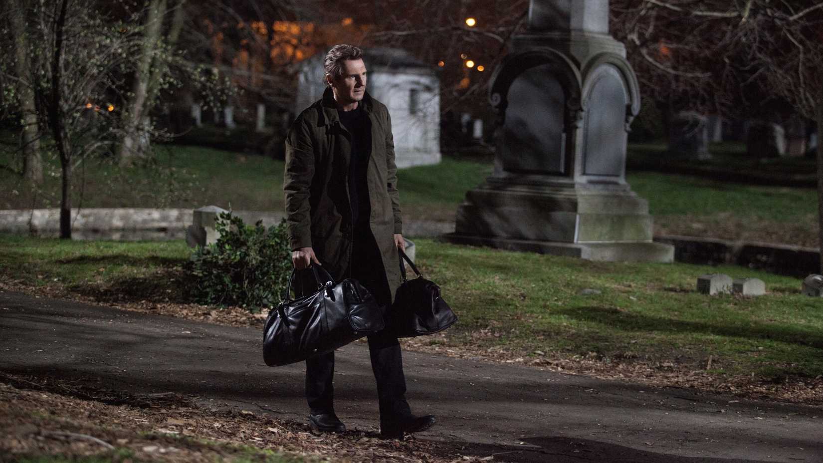 Matthew Scudder giving the money to the killers in A Walk Among the Tombstones
