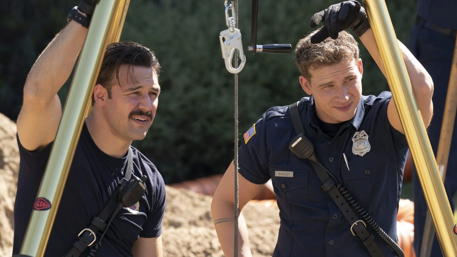 Eddie and Buck pose together in 9-1-1