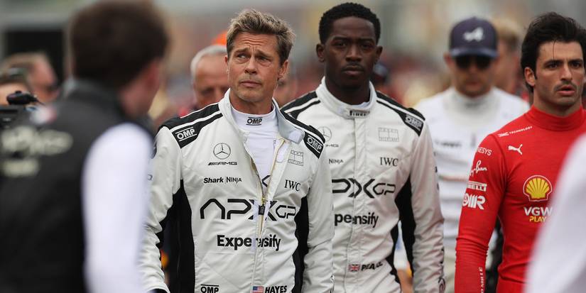 Brad Pitt and Damson Idris in F1 walking on the track