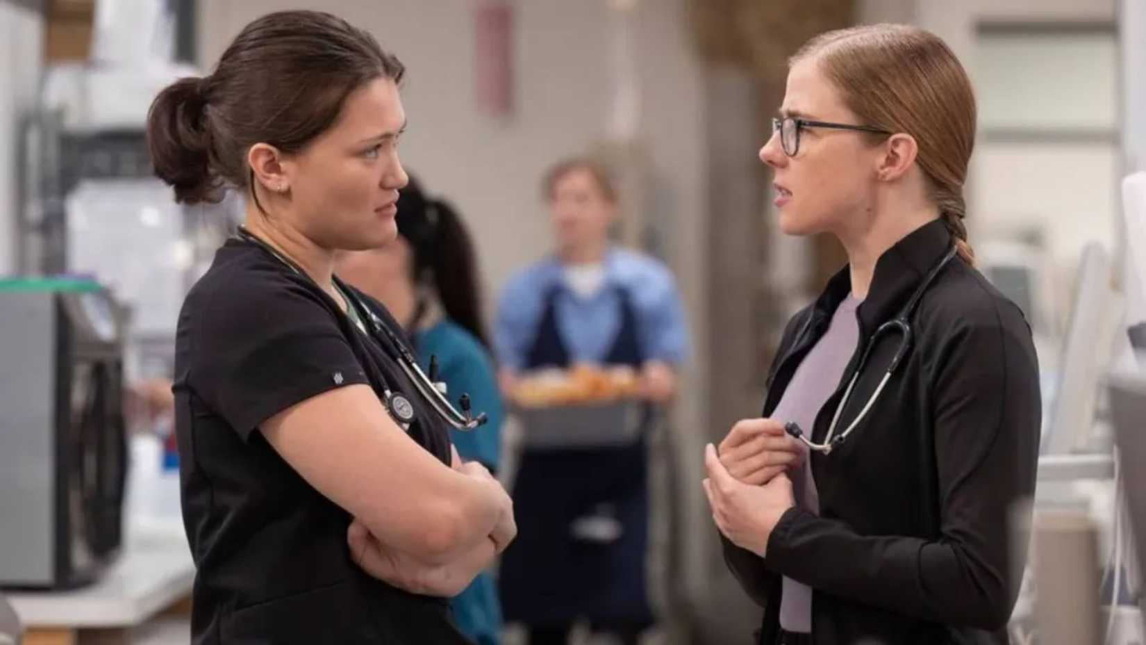 Isa Briones as Dr. Trinity Santos and Taylor Dearden as Dr. Mel King in The Pitt