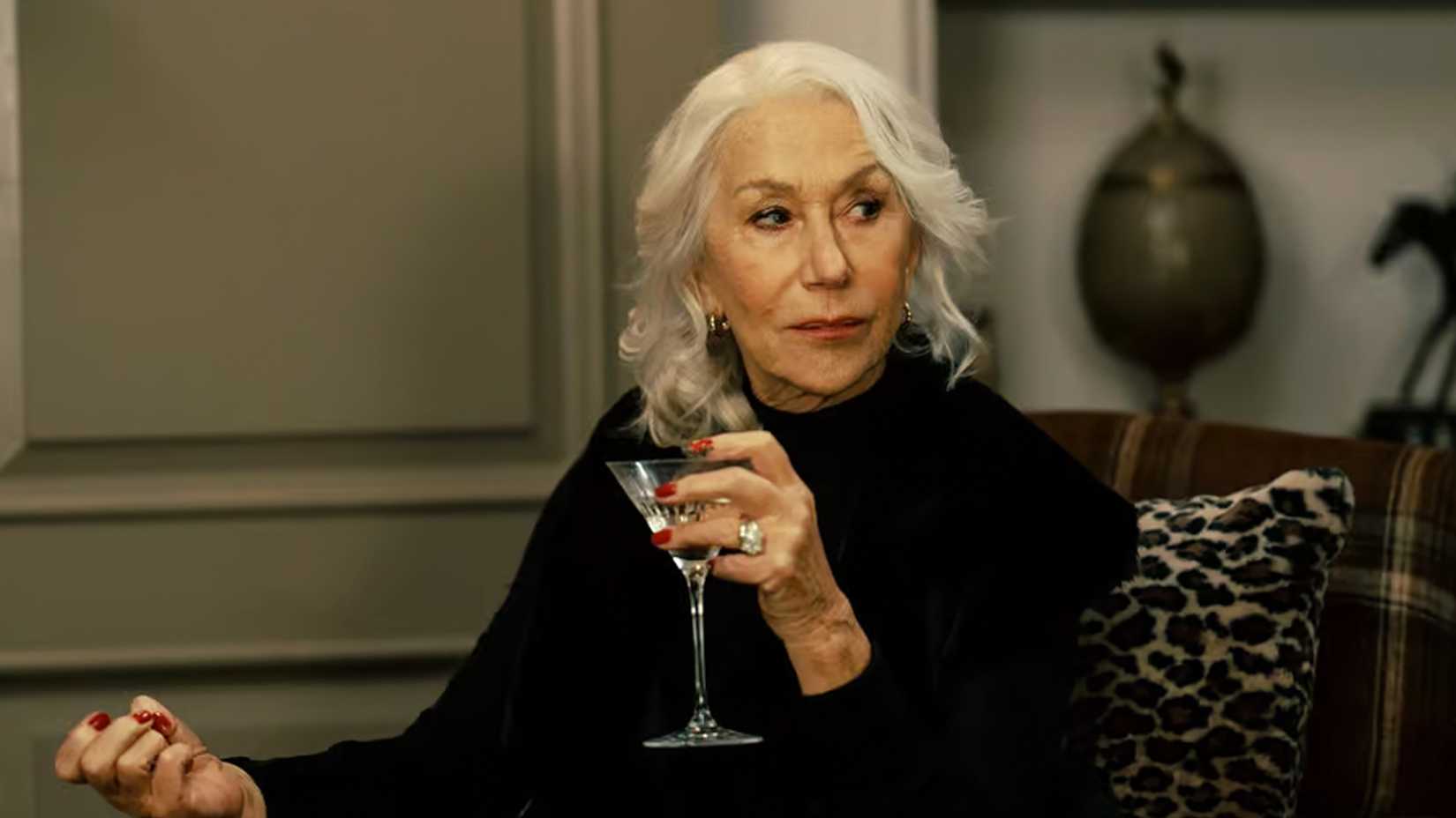 Helen Mirren as Maeve Harrigan holding a martini glass in MobLand.