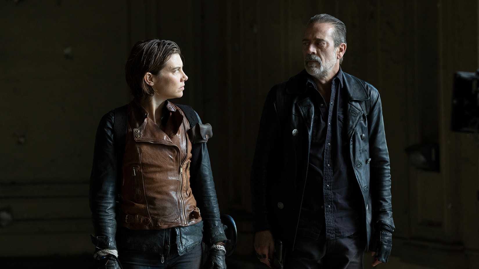 Maggie looking at Negan as they walk together in The Walking Dead: Dead City.