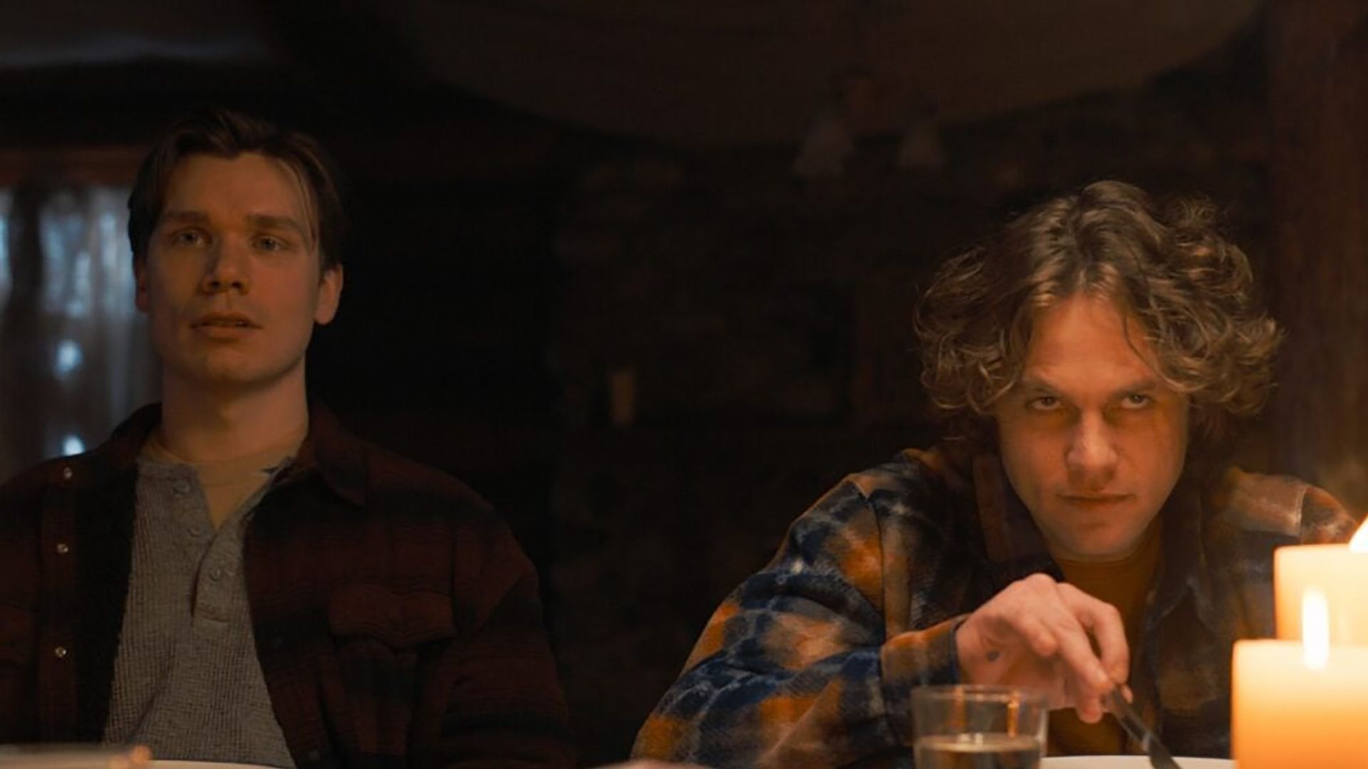 Dash and Rufus at the dinner table looking creepy in Tracker