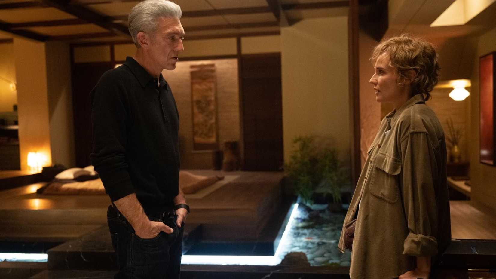 Vincent Cassel and Diane Kruger discuss conspiracy theories in The Shrouds