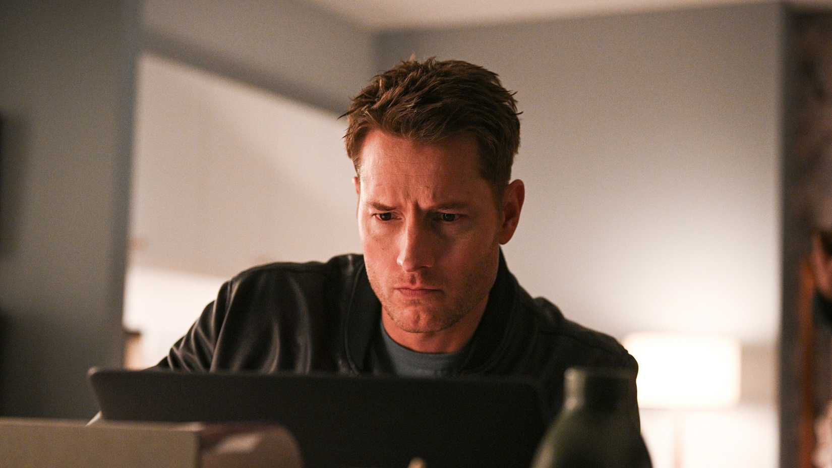 Colter sitting behind a computer in Tracker