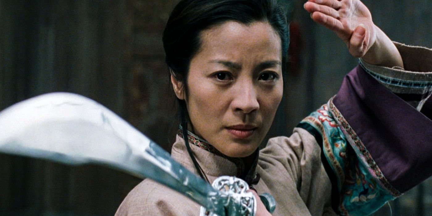 Michelle Yeoh as Yu Shu points a sword in Crouching Tiger, Hidden Dragon