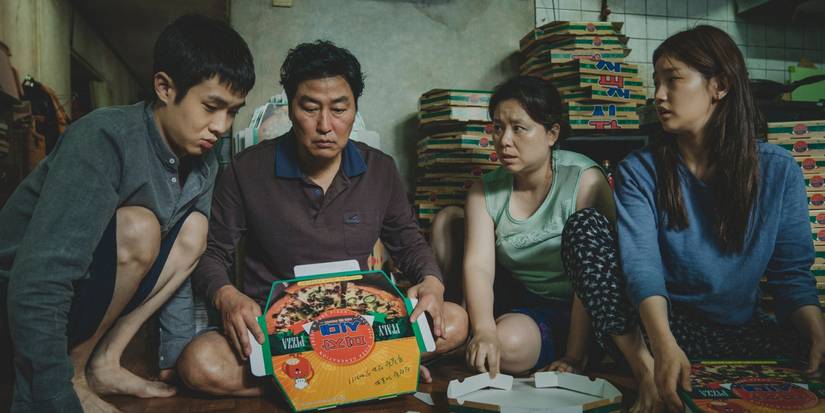 Parasite movie with the csat sitting in their living room