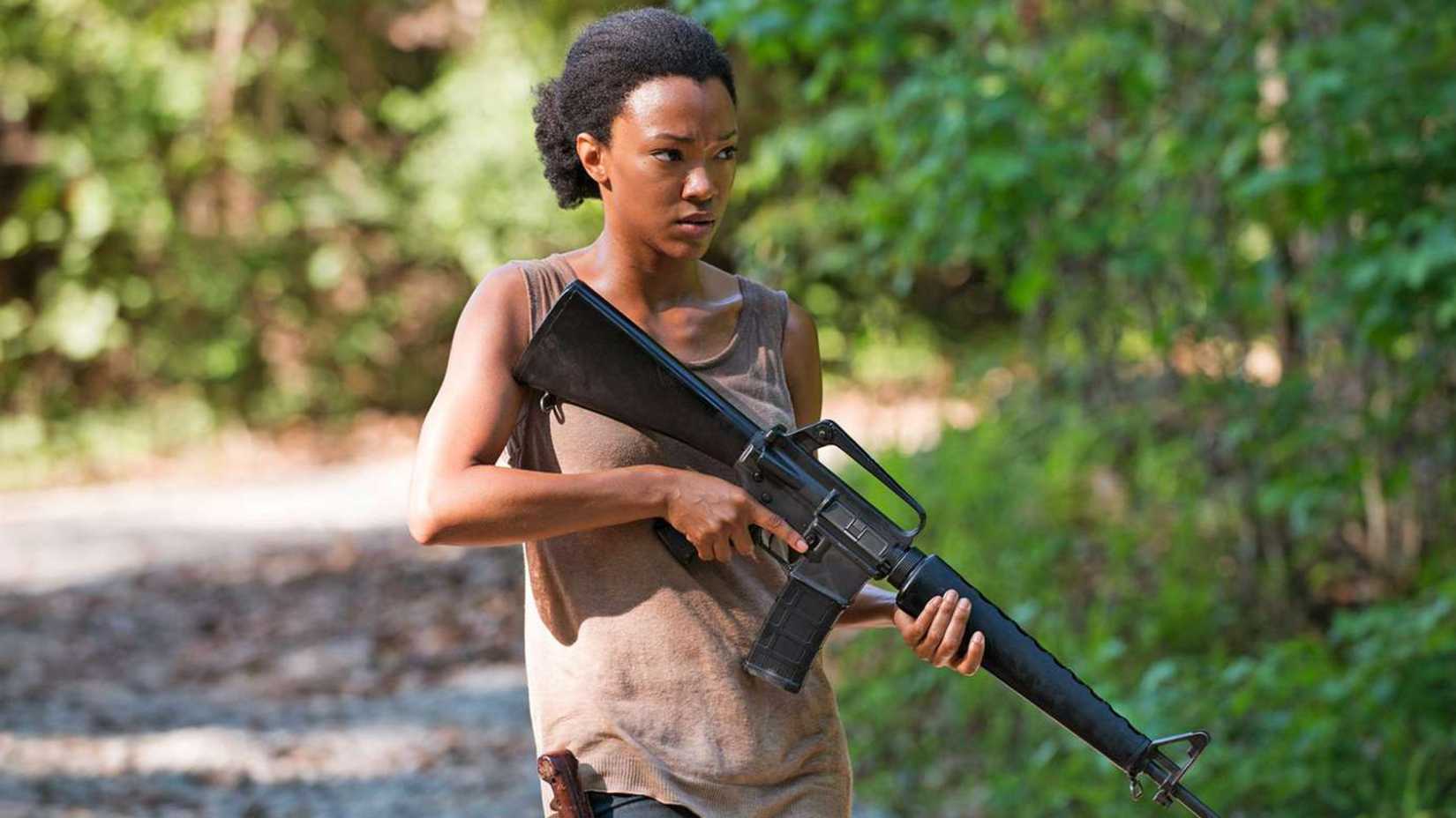 Sasha holds a rifle in The Walking Dead