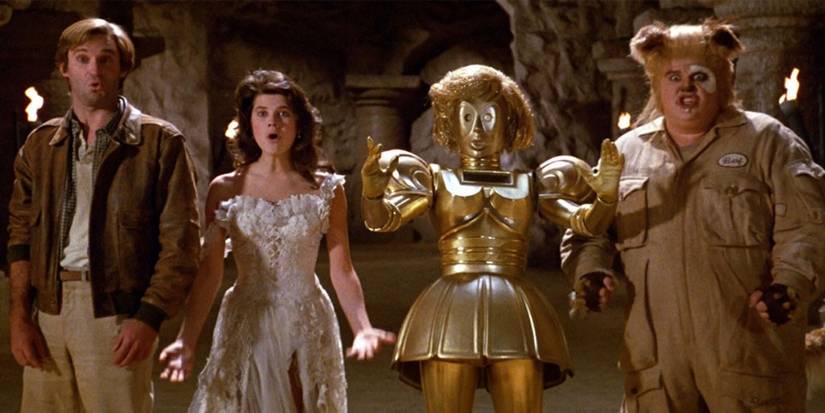 Bill Pullman's Lone Starr, Daphne Zuniga's Princess Vespa and her droid Dot Matrix, and John Candy's Barf in Spaceballs