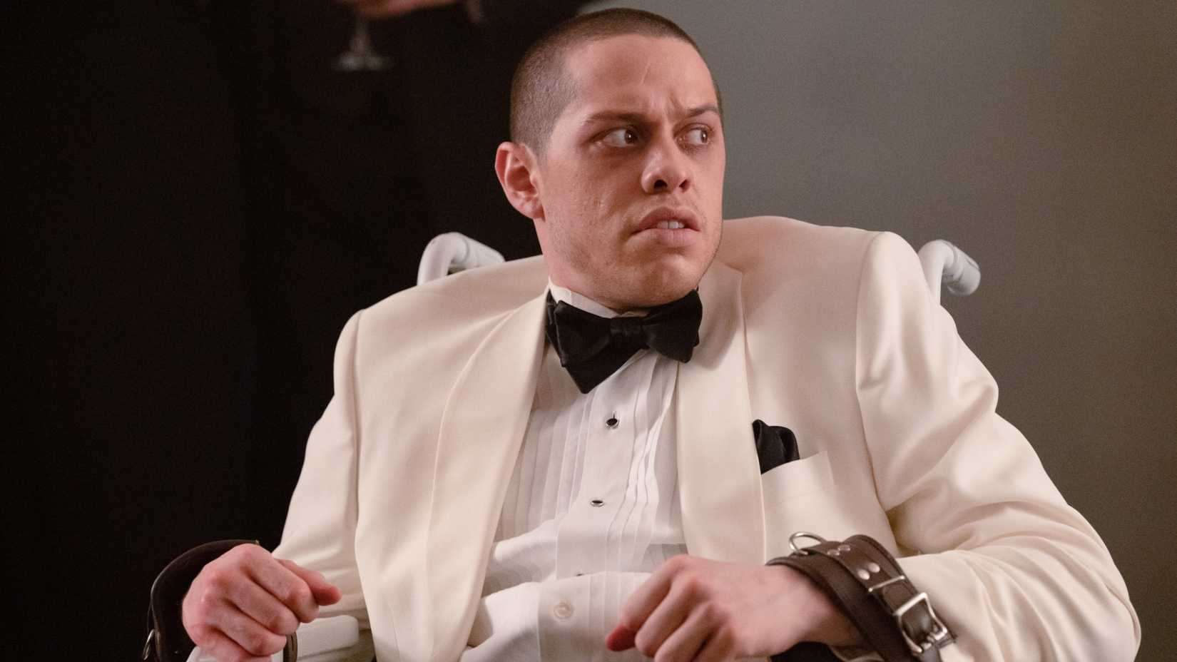 Pete Davidson is bound to a chair in The Home