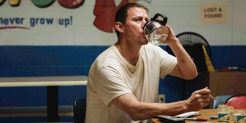Channing Tatum in Roofman drinking water