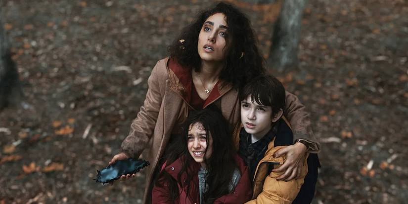Aneesha and her children look to the sky in Invasion