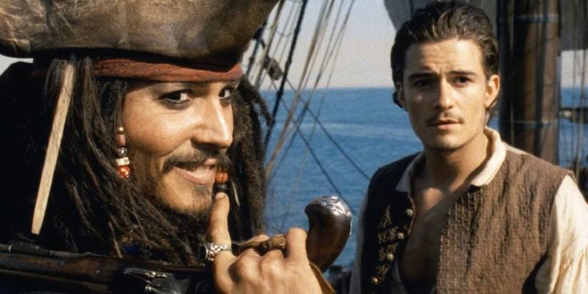 Johnny Depp and Orlando Bloom in Pirates of the Caribbean The Curse of the Black Pearl