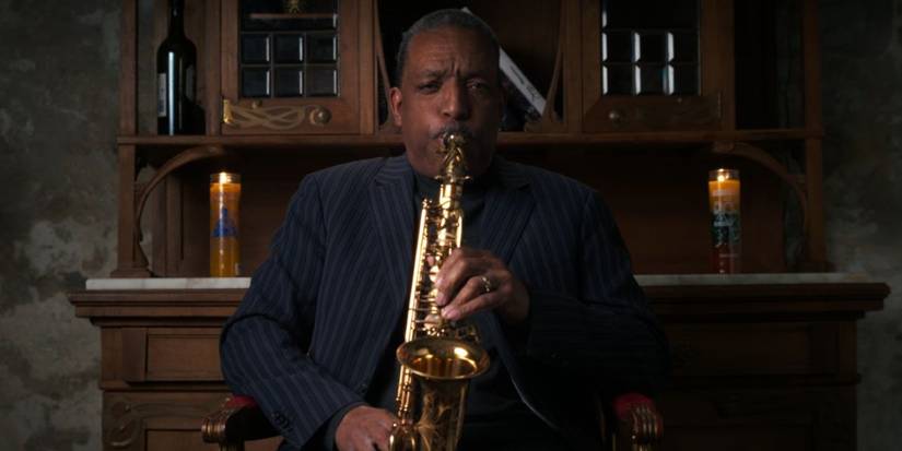 Footage from Katrina: Come Hell and High Water with a man playing a saxaphone