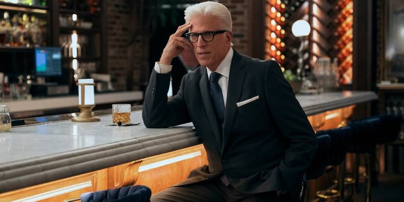 Ted Danson's Charles Nieuwendyk sitting at a bar in A Man on the Inside Season 2