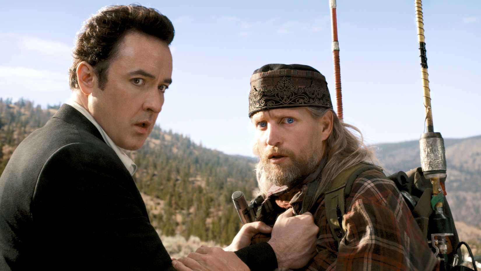 John Cusack and Woody Harrelson in 2012