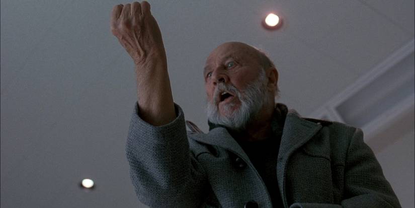 Donald Pleasence as Dr. Sam Loomis, looking terrifed at his risk, in Halloween: The Curse of Michael Myers - The Producer's Cut