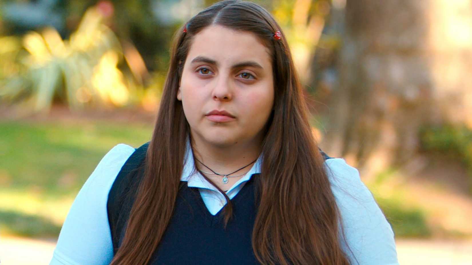Beanie Feldstein in a school uniform in Lady Bird.