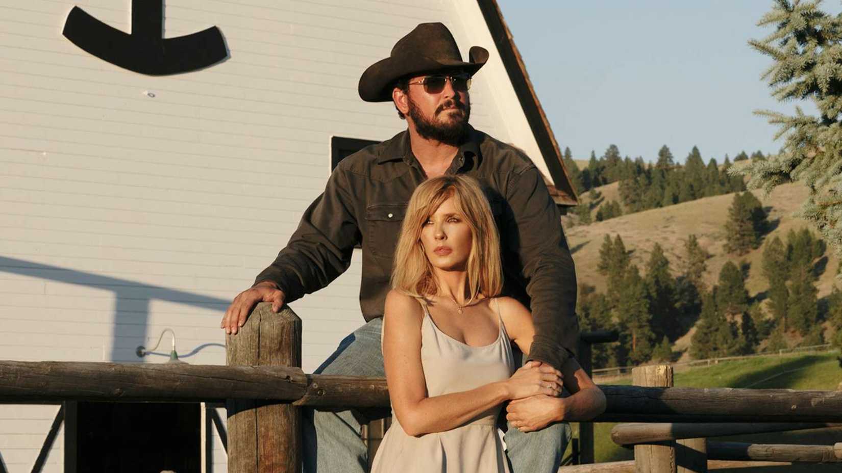 Beth & Rip embrace in Yellowstone