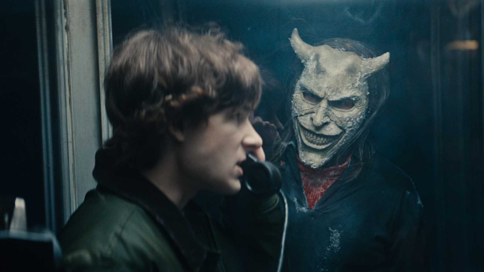 Mason Thames as Finney and Ethan Hawke as The Grabber in Black Phone 2