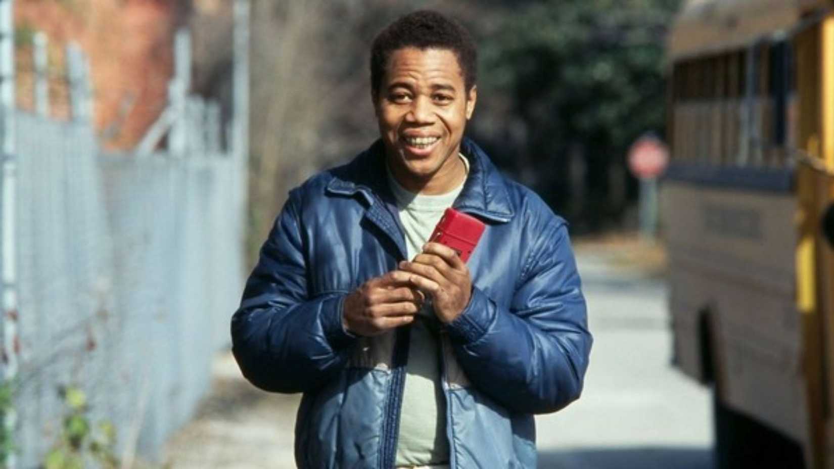 Cuba Gooding Jr. holds a radio in the movie Radio