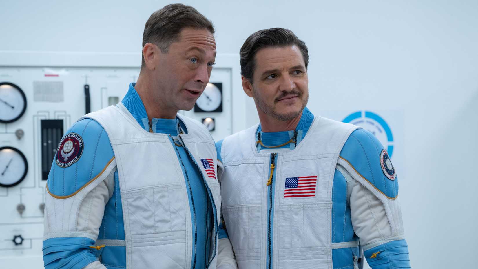 Ebon Moss-Bachrach and Pedro Pascal in The Fantastic Four: First Steps in their space suits
