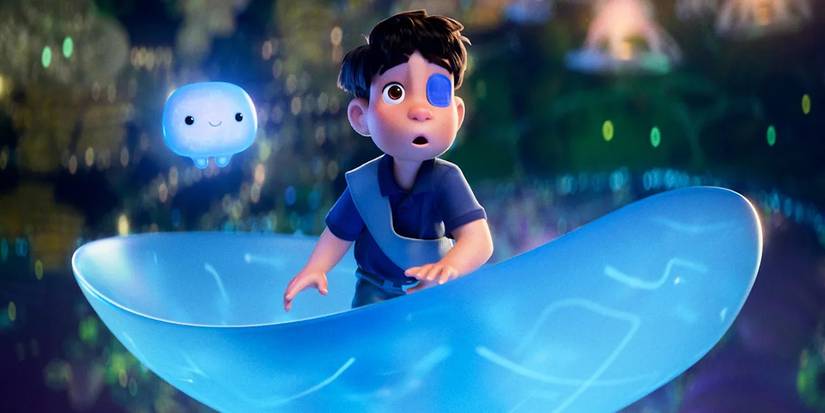 Elio Solís with Ooooo, a blue gelatinous liquid supercomputer, in Disney-Pixar's Elio