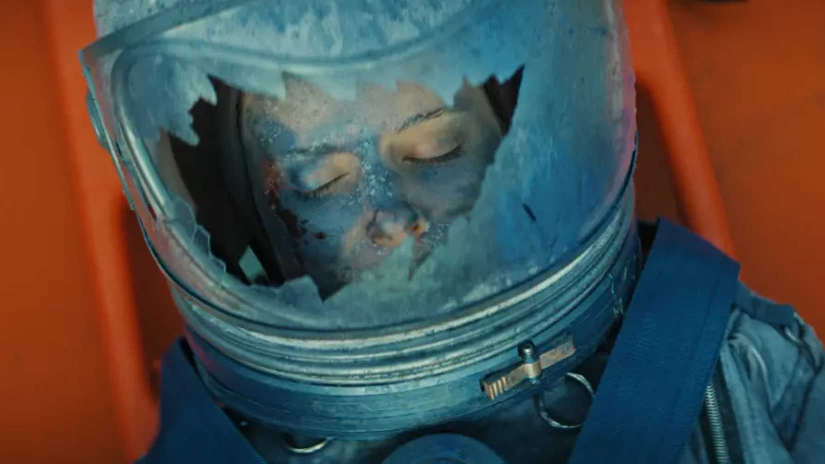 Kate Mara in a damaged spacesuit in the film the astronaut