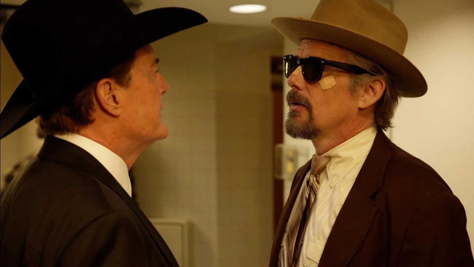 Lee Raybon sizing up Donald Washberg in FX's The Lowdown