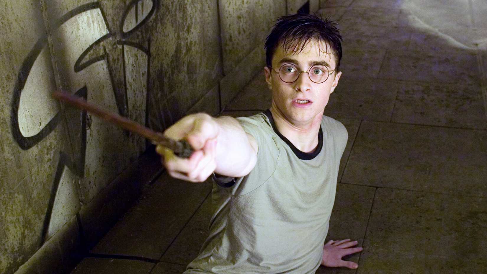 Daniel Radcliffe as Harry Potter.