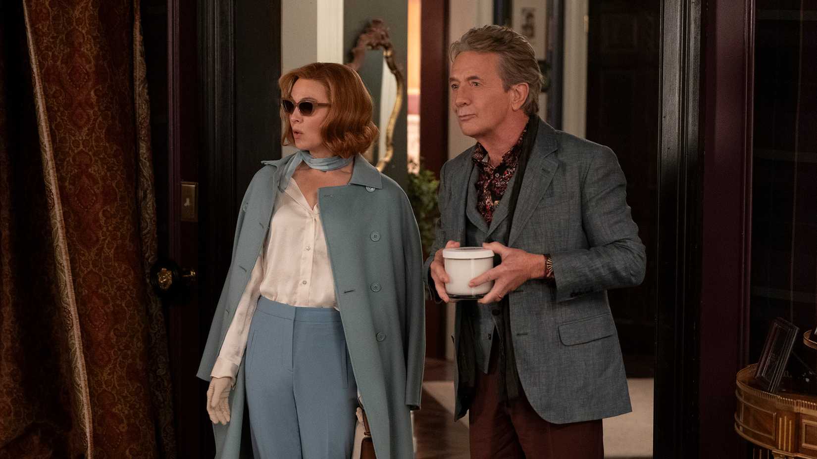 Camilla walking with Oliver in Only Murders in the Building.