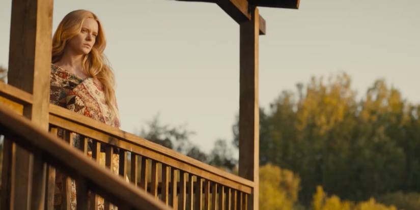 Sarah stands on the porch in Redeeming Love