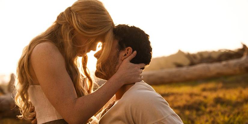 Sarah and Michael embrace at dusk in Redeeming Love