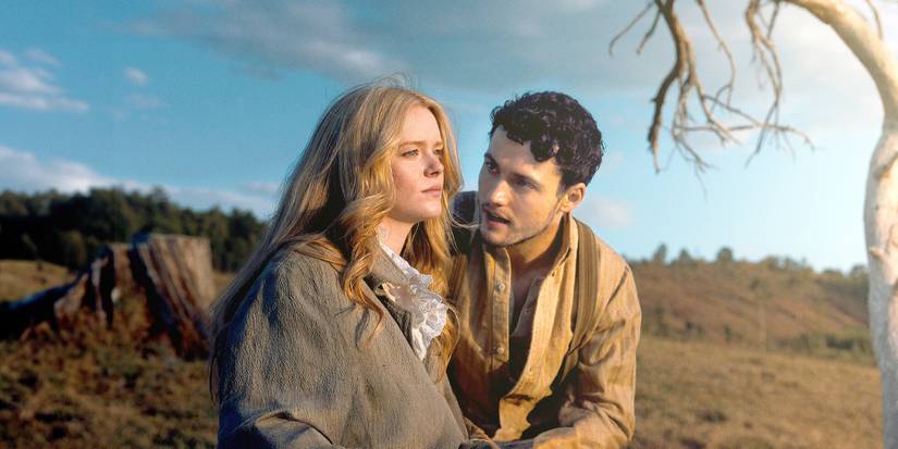 Sarah and Michael sit under a tree in Redeeming Love