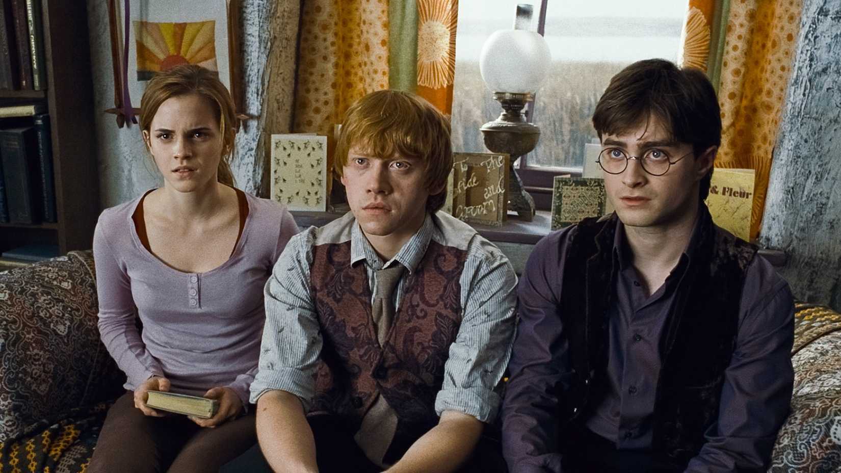 Ron Hermione and harry in the Harry Potter franchise