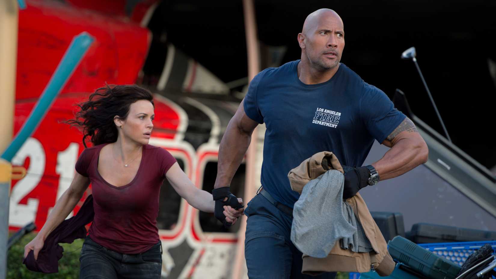 Carla Gugino and Dwayne Johnson in San Andreas