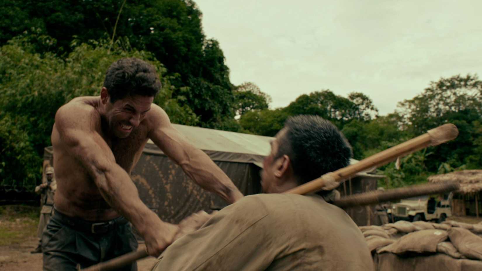 James fights an enemy in Prisoner of War
