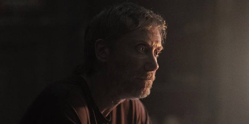 A side profile of Stephen Merchant as Julian in the dark in The Walking Dead: Daryl Dixon.