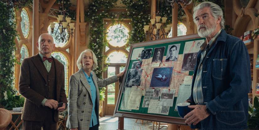 Liz touches a crime board in The Thursday Murder Club
