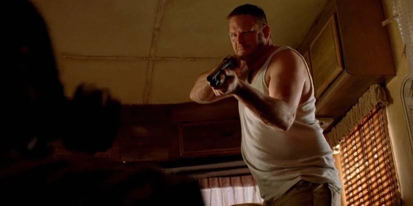 Badger's cousin Clovis points a gun at Jesse (Breaking Bad)